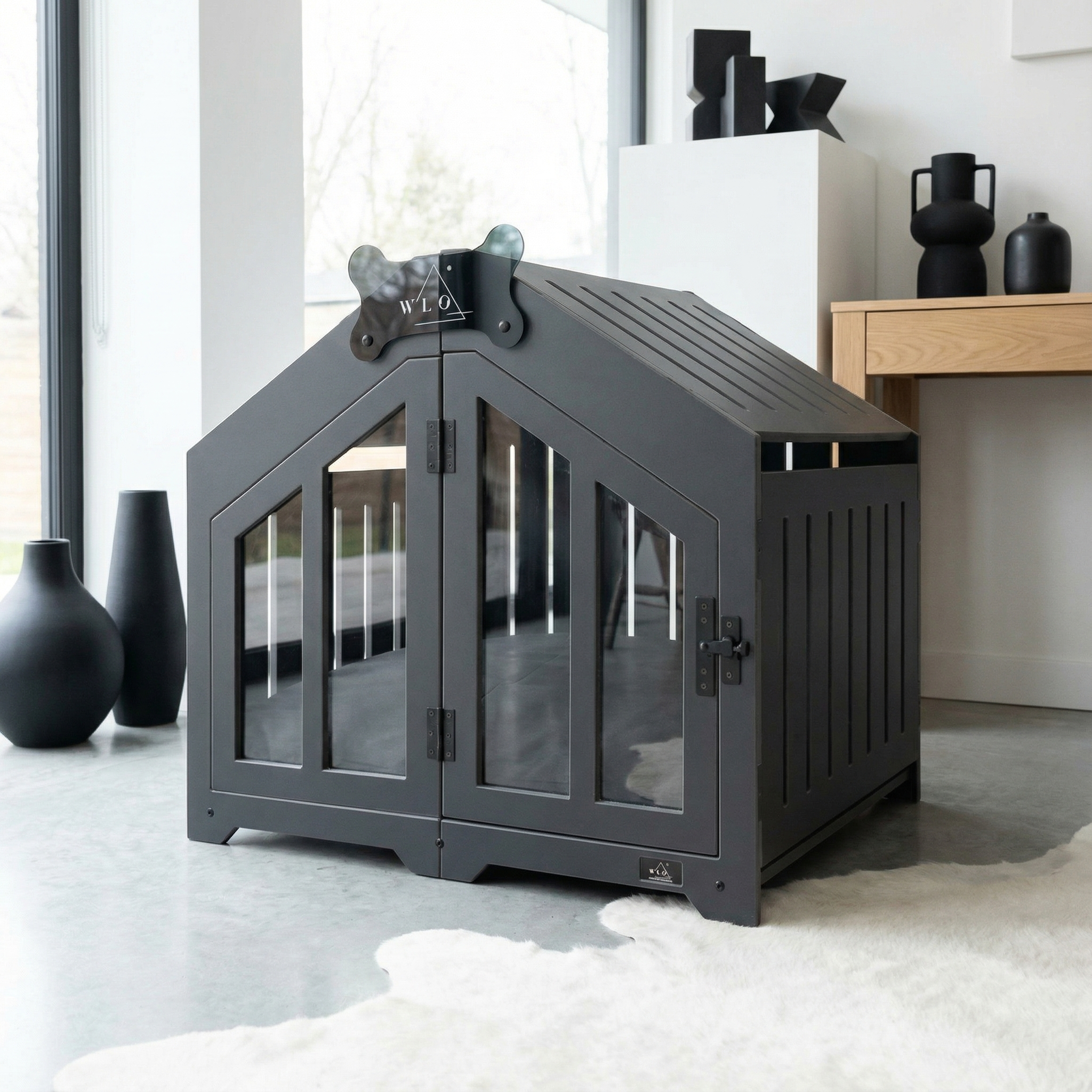 Gray pet crate with glass doors in a modern living room setting