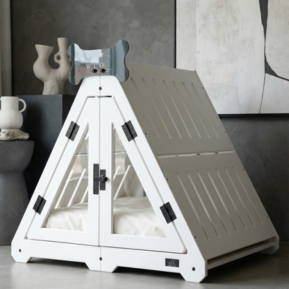 White pet playpen with a gray door in a room setting