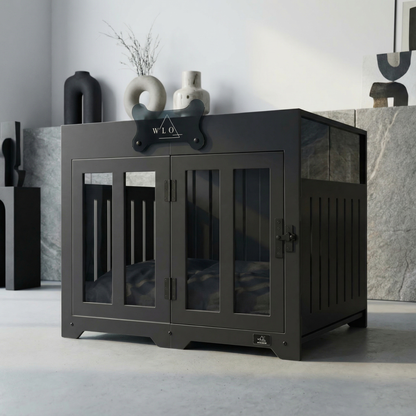 Black pet crate with 'W.L.O' branding in a modern interior setting.