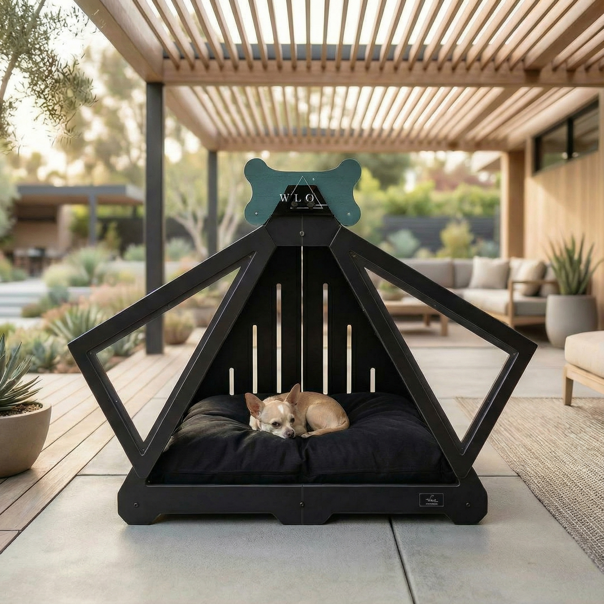 Black pet teepee with a dog inside on a patio
