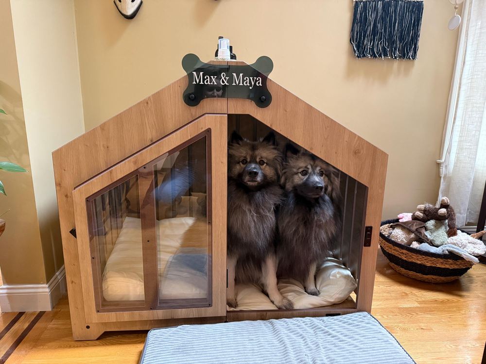 A customer’s Gabled dog house in Natural Oak, Size 3. Customer photo from a review, Dec 2025.